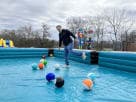 Giant billiard pool table soccer interactive rental in Austin with turquoise ball pit, perfect for Cedar Park backyard parties.