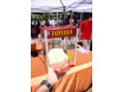 Perfect for Dallas parties, this red and white popcorn machine rental includes 2 tables and 12 chairs for up to 50 servings.