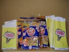 Extra popcorn supplies for 50 servings available for rental in Houston — perfect for Sugar Land parties with yellow bags