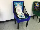 Potty Toss carnival game rental in Austin with toilet seat target, perfect for Kyle birthday parties and family events.