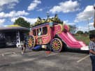 Princess Carriage bounce house rental in Dallas with dual slides, ideal for Mesquite birthday parties and outdoor events.