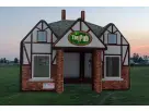 Perfect for Houston college events, this inflatable Pub rental features a charming Tudor-style design ideal for parties