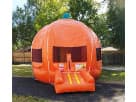 Pumpkin bounce house rental in Dallas with bright orange design, ideal for fall festivals and Garland parties.