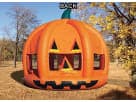 Orange jack-o'-lantern bounce house rental in Dallas, ideal for fall festivals with bright carved features perfect for toddlers