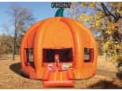 Pumpkin bounce house rental in Dallas with bright orange exterior, ideal for Garland fall festivals and parties.
