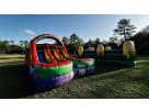 Rainbow Kids Double Slide rental in Houston with wet or dry options, ideal for Pearland parties.