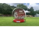 Large inflatable Christmas snow globe rental with festive lights, perfect for holiday parties in Dallas and ideal for Mesquite