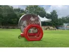 Christmas tunnel bounce house rental in Dallas with festive lights—ideal for Frisco holiday parties.