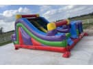 Retro Radical obstacle course rental in Houston with rockwall slide, ideal for League City parties.