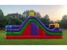Retro Radical obstacle course rental in Houston with rockwall slide — ideal for Conroe parties.
