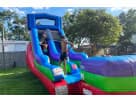 15ft Retro Rainbow wet and dry slide rental in Austin — perfect for San Marcos backyard parties with kids of all ages.