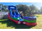 15ft Retro Rainbow wet and dry water slide rental in Austin, perfect for Cedar Park backyard parties with kids of all ages.