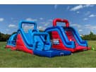 Renta de obstacle course 140ft U-Turn en Houston ideal para niños aventureros con dual slides y climbing walls.