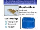 Heavy-duty reusable sandbags for bounce house rental in Dallas—compare durable blue bags versus torn cheap alternatives