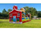 School House & Bus obstacle course rental in Austin with slide and tower, perfect for Georgetown birthday parties and events.