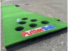 Putterball Golf Pong Game rental in Dallas with synthetic turf mat—ideal for Mesquite backyard parties.
