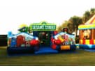Sesame Street toddler bounce house rental in Austin with kid-friendly slide, ideal for Pflugerville birthday parties.