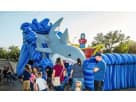 Gone Fish'n Shark water slide rental in Houston with wet or dry capability, ideal for Conroe parties.