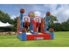 Shooting Stars Basketball Shootout interactive bounce house rental in Dallas with dual slides, set up in a park—ideal for Irving