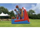 Red and blue basketball shootout bounce house rental in Dallas, ideal for interactive party games with dual slides.