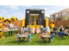 Skid Loader Construction bounce house rental in Austin with huge jumping area — ideal for Buda birthday parties.