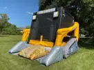 Perfect for Austin construction-themed birthday parties, this Skid Loader bounce house rental features a huge jumping area