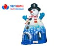 Blue and white Snowman bounce house rental in Dallas with castle design, perfect for Grand Prairie holiday parties.