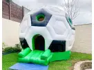 Perfect for Austin birthday parties, this soccer-themed bounce house rental features a large black and white inflatable ball