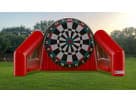 Perfect for Houston birthday parties, this red Soccer Darts inflatable rental features a massive Velcro target and soccer balls