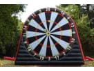 Soccer Darts inflatable game rental in Austin with massive Velcro target, ideal for all ages at outdoor parties.