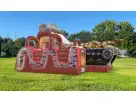 Military-themed obstacle course rental in Dallas with dual slides and rock wall, ideal for large events and McKinney birthday