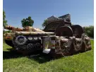 Military tank obstacle course rental in Austin with kid-friendly rock wall and dry slides, perfect for Buda events.