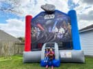 Star Wars bounce house rental in Houston with blue and red character graphics, ideal for Katy parties with kids ages 3+.