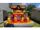 Tropical dual lane water slide rental in Houston with palm tree design, ideal for backyard parties in League City.