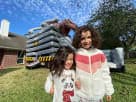 Ultimate T-Rex bounce house rental in Houston with dual cannons, perfect for Conroe birthday parties.