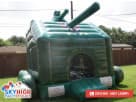 Green military tank bounce house rental in Austin holds up to 5 kids, perfect for Leander birthday parties and army-themed events.