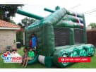 Colorful monster bounce house rental in Round Rock features bright green design, ideal for Austin birthday parties and outdoor fun.