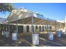 30ft x 20ft drive-through tent rental in Houston with sturdy metal frame, ideal for markets and outdoor events in Katy.
