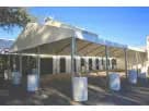 30ft x 20ft drive-through tent rental in Houston with sturdy metal frame, ideal for markets and outdoor events in Katy.