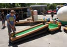 Dallas drop putt putt golf game rental features vibrant inflatable greens with sturdy wooden frames, perfect for Arlington parties.