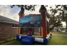 Thomas the Train 13x13 bounce house rental in Dallas residential yard, ideal for Frisco birthday parties.