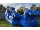 Tobogán acuático dual con diseño de onda disponible para renta en Austin — perfecto para niños desde los 3 años en eventos
