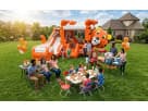 Tiger Belly bounce house rental with dual slides and basketball hoop set up in a Houston backyard, ideal for wet or dry parties