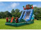 Tropical water slide rental in Austin with dual slides and pool, ideal for Buda summer parties.