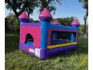 Pink and purple castle bounce house rental in Austin, perfect for toddlers and indoor or outdoor Georgetown parties.