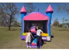 Pink and blue dual-tower bounce castle rental in Houston, ideal for girl-themed birthday parties in Spring.