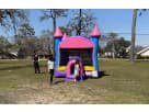 Pink Castle bounce house rental in Houston with dual towers, ideal for Cypress birthday parties.