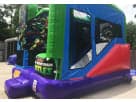 Perfect for Dallas kids' parties, this Ninja Turtles 5in1 bounce house rental features a wet or dry slide with climbing wall