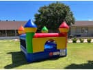 Perfect for Dallas toddlers, this colorful tiny castle bounce house rental holds 4 kids and works indoors or outdoors.