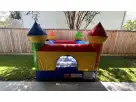Colorful indoor/outdoor tiny castle bounce house rental in Austin holds 4 kids, ideal for Buda birthday parties with bright